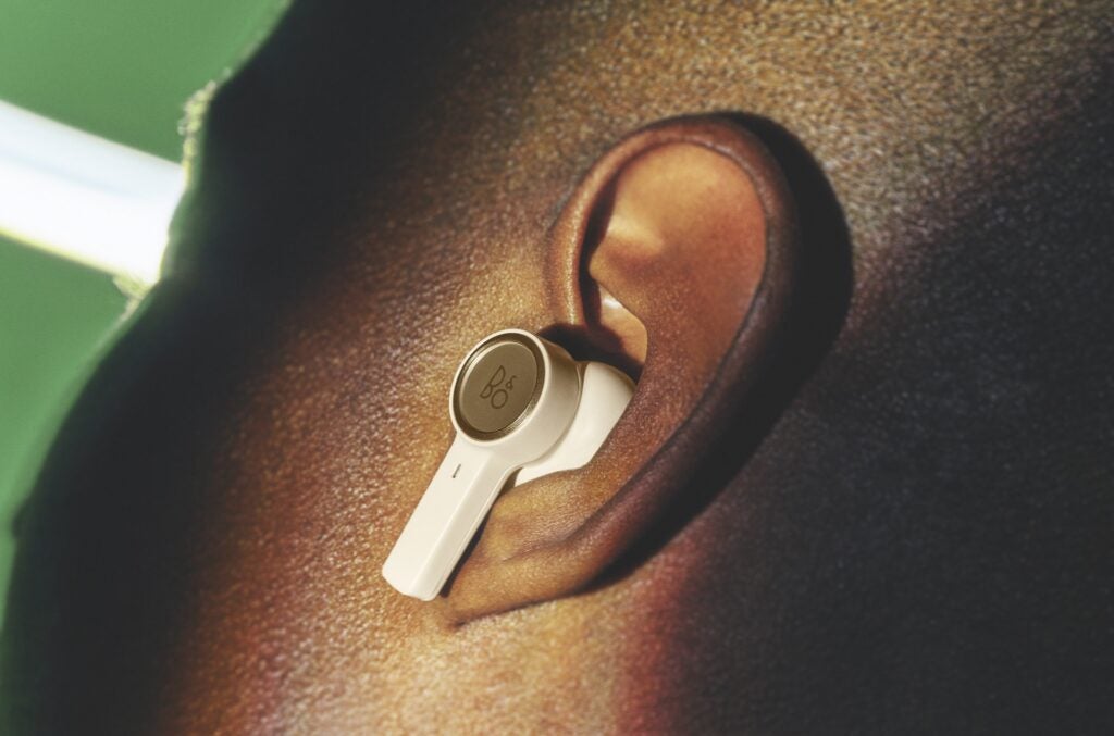 Beoplay EX being worn by a model